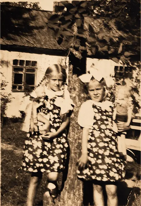 Genia and Nusia with dolls